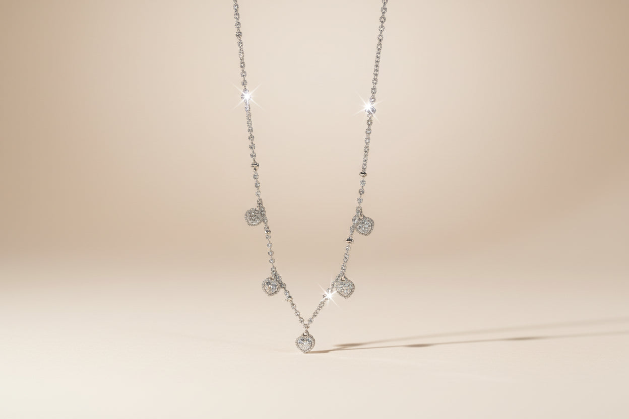 Collana a Sfere 5 Cuori Pendenti